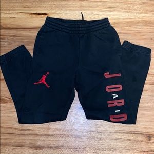 Black and red Jordan athletic pants size Medium